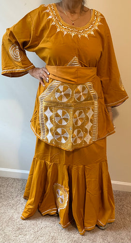 African Skirt Set made in Ghana has embroidery on the top and bottom.